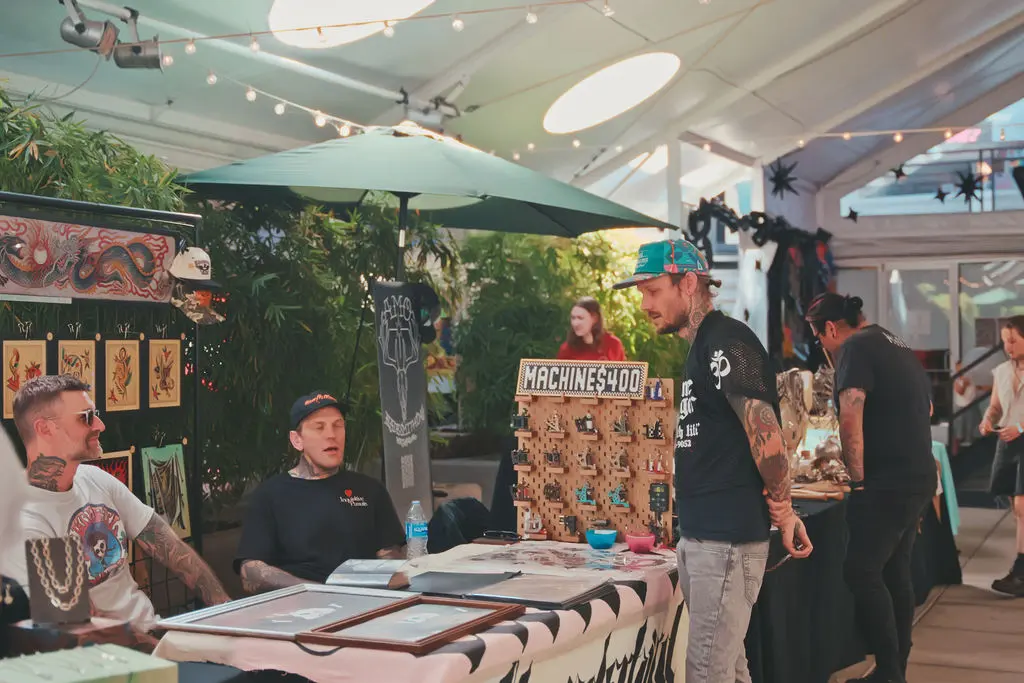 Festival attendee moment at VOID Tattoo Fest.